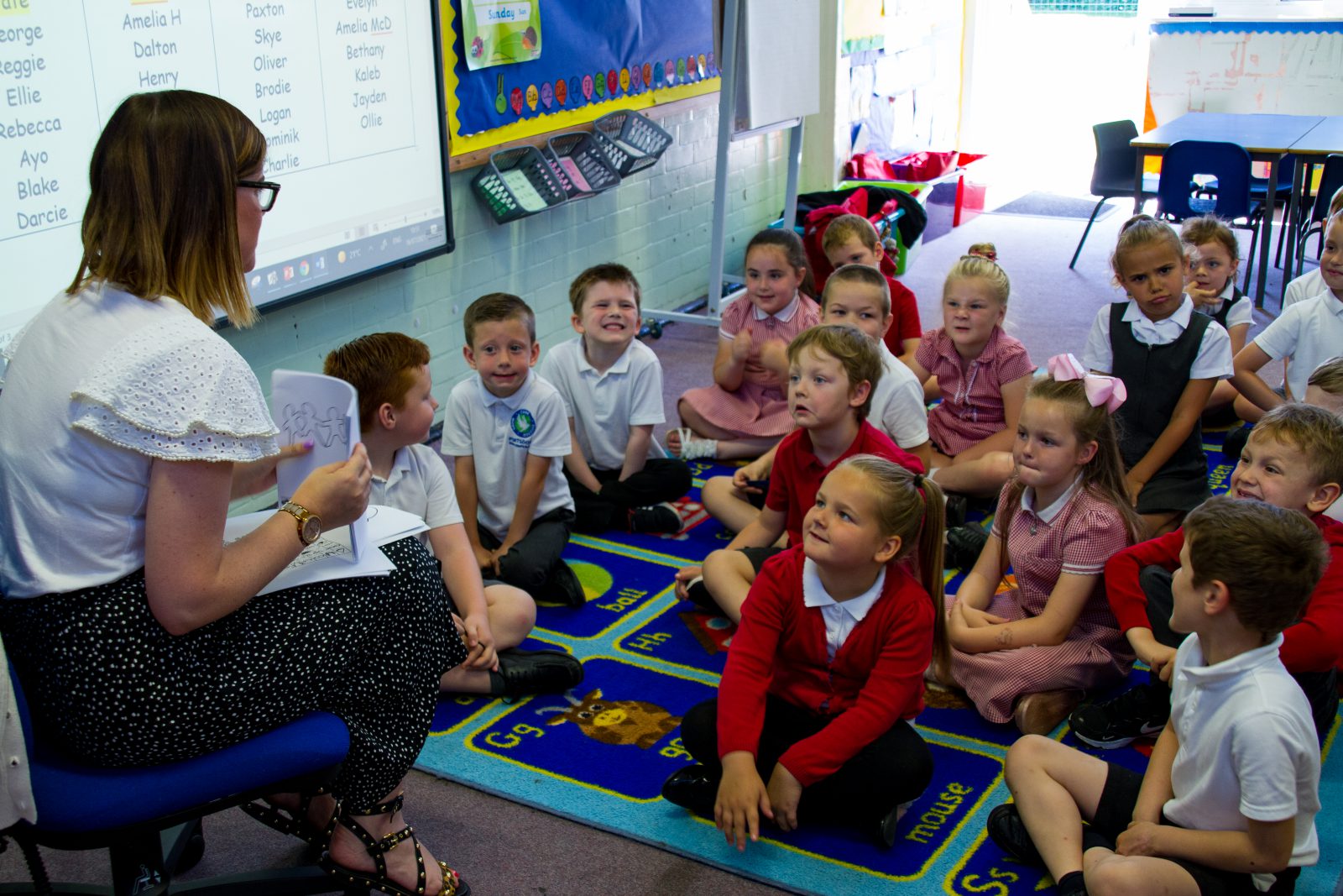 Classroom with teacher reading to children